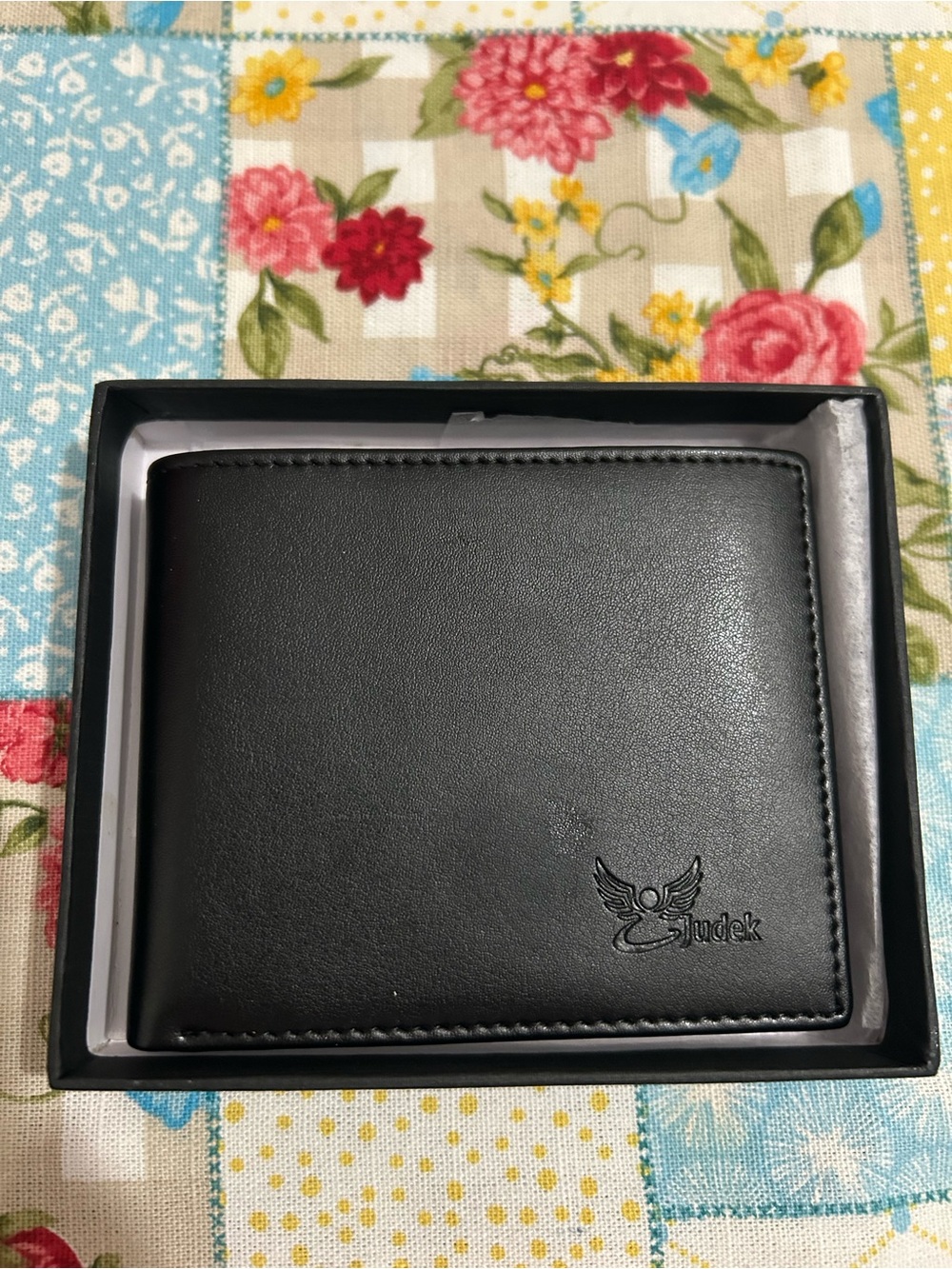 Black Bi-Fold Men's Wallet with Embossed Logo